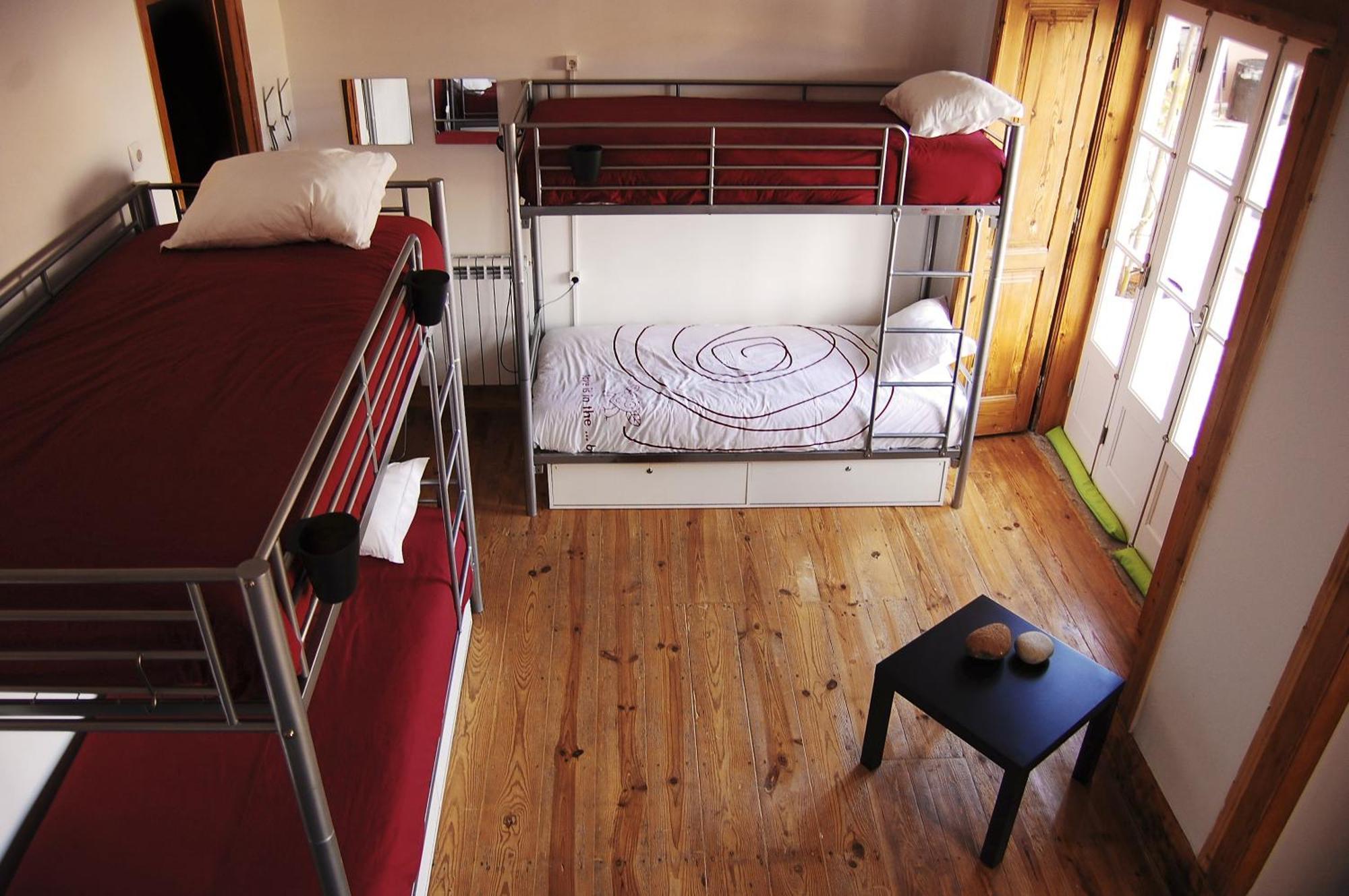 Cama individual en habitación compartida mixta (6 camas)